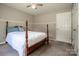 Comfortable bedroom with a large bed and neutral decor at 2811 Saint James Church Rd, Denver, NC 28037