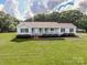 Charming ranch-style home with well-manicured lawn and inviting front porch at 2811 Saint James Church Rd, Denver, NC 28037