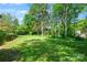 Expansive backyard perfect for outdoor activities and entertaining with plenty of space for play or relaxation at 3103 Lauren Glen Rd, Charlotte, NC 28226
