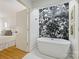 Modern bathroom with a standalone tub and elegant tile at 3103 Lauren Glen Rd, Charlotte, NC 28226