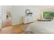 Well lit bedroom with a large dresser, hardwood floors, and sliding doors to the deck at 3103 Lauren Glen Rd, Charlotte, NC 28226