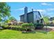 A beautifully designed home exterior featuring a deck, well-maintained yard, and stylish architectural details at 3103 Lauren Glen Rd, Charlotte, NC 28226