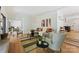 Relaxing living room with modern decor, hardwood floors, and a comfortable seating area at 3103 Lauren Glen Rd, Charlotte, NC 28226
