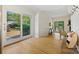 Spacious living area showing the hardwood flooring, outdoor access and minimalist styling at 3103 Lauren Glen Rd, Charlotte, NC 28226