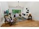 Bright living room with vaulted ceilings and sliding doors to the outdoor deck at 3103 Lauren Glen Rd, Charlotte, NC 28226