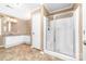 Bathroom features a large vanity, tiled floors, and a glass-enclosed shower at 311 Cooks Lake Rd, Gastonia, NC 28056