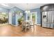Lovely eat-in kitchen features stainless steel appliances and a seamless flow to the dining area at 311 Cooks Lake Rd, Gastonia, NC 28056