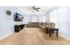 Inviting living room with a large sectional sofa, a ceiling fan, and blue walls at 311 Cooks Lake Rd, Gastonia, NC 28056