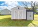 A well-maintained shed offers practical storage solutions and complements the surrounding landscape at 311 Cooks Lake Rd, Gastonia, NC 28056
