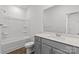 Full bathroom featuring modern vanity and shower over tub at 4004 Crooked Spruce Ct, Matthews, NC 28105