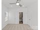 Comfortable bedroom with neutral carpet, ceiling fan, and ensuite bathroom entrance at 4004 Crooked Spruce Ct, Matthews, NC 28105
