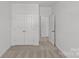 Neutral carpet in the spacious bedroom with dual door closets at 4004 Crooked Spruce Ct, Matthews, NC 28105