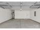 Clean, empty two-car garage ready for vehicles or storage at 4004 Crooked Spruce Ct, Matthews, NC 28105