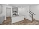 Modern kitchen island with granite countertops, gray cabinets, and stainless steel appliances at 4004 Crooked Spruce Ct, Matthews, NC 28105