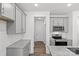 Contemporary kitchen featuring granite countertops, stainless steel appliances, and gray cabinets at 4004 Crooked Spruce Ct, Matthews, NC 28105