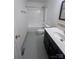 Clean bathroom showcasing a vanity with black cabinet, sink, toilet, and shower/tub combo at 405 N Wilson St # 101, Rock Hill, SC 29730