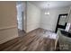 Cozy dining area with elegant lighting, adjacent to the updated kitchen with fresh paint at 405 N Wilson St # 101, Rock Hill, SC 29730