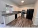 Modern kitchen with stainless appliances, granite countertops, and ample cabinet space at 405 N Wilson St # 101, Rock Hill, SC 29730