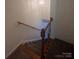 Carpeted staircase featuring wood handrails and black iron spindles leading to the upper level at 405 N Wilson St # 101, Rock Hill, SC 29730
