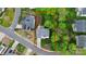 Aerial view of the home showing the roof, driveway, and mature landscaping at 4086 Buckingham Dr, Fort Mill, SC 29707