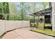 Backyard patio with a covered deck and a privacy fence at 4086 Buckingham Dr, Fort Mill, SC 29707