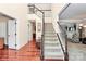 Spacious foyer featuring a grand staircase with wood floors and neutral walls that lead to living areas at 4086 Buckingham Dr, Fort Mill, SC 29707