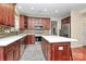 Spacious kitchen with stainless steel appliances, white countertops, and mosaic tile backsplash at 4086 Buckingham Dr, Fort Mill, SC 29707