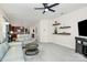 Open living room with TV, fireplace, couch, and an open view to the kitchen at 4086 Buckingham Dr, Fort Mill, SC 29707