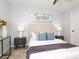 Bedroom with an ceiling fan, modern decor, and neutral color palette at 501 Olmsted Park Pl # N, Charlotte, NC 28203