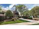 Manicured landscaping frames the entrance of a charming community center at 501 Olmsted Park Pl # N, Charlotte, NC 28203