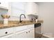 Kitchen featuring granite counters, stainless steel appliances, and ample cabinet space at 501 Olmsted Park Pl # N, Charlotte, NC 28203