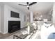 Cozy living room featuring a fireplace, TV, and modern furnishings at 501 Olmsted Park Pl # N, Charlotte, NC 28203
