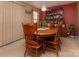 Elegant dining room with a wooden table, decorative china cabinet, and traditional decor at 5127 Fernhill Dr, Charlotte, NC 28217