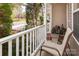 Cozy porch with a chair, offering a relaxing view of the quiet neighborhood street at 5127 Fernhill Dr, Charlotte, NC 28217