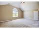 Bedroom featuring large window and neutral paint, creating a bright and inviting retreat at 5713 Falkirk Ln, Matthews, NC 28104