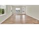 Spacious living room with bright windows, hardwood floors, and a welcoming atmosphere at 5850 Strathmore Ct, Charlotte, NC 28215