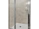 Modern shower with stylish stone-look tiling and frameless glass door at 5850 Strathmore Ct, Charlotte, NC 28215