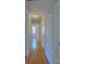 Hallway featuring wood floors at 6430 Farmingdale Dr, Charlotte, NC 28212