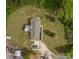 Overhead aerial view showing house, landscaping and parking area in a natural setting at 6599 Mcintosh Rd, Stanley, NC 28164