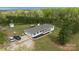 Aerial view of the home highlighting its location, yard, and landscaping at 6599 Mcintosh Rd, Stanley, NC 28164