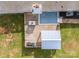 Aerial of a wooden back deck with outdoor seating and a grill, perfect for entertaining at 6599 Mcintosh Rd, Stanley, NC 28164