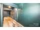Finished basement area features durable flooring, neutral colors, and ample space at 6599 Mcintosh Rd, Stanley, NC 28164