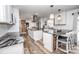 Modern kitchen features granite countertops, stainless appliances, and two islands at 6599 Mcintosh Rd, Stanley, NC 28164