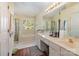 Large bathroom with double sinks, soaking tub, and a separate shower at 6615 Wickville Dr, Charlotte, NC 28215