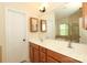 Bathroom featuring double sink vanity, large mirror, walk-in shower and soaking tub at 729 Naramore St, Davidson, NC 28036