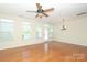 Bright living room with hardwood floors and natural light at 729 Naramore St, Davidson, NC 28036