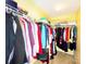 Walk-in closet with multiple clothing racks and storage shelves at 7928 Ponderosa Pine Ln, Charlotte, NC 28215