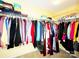 Walk-in closet featuring ample clothing racks, wire shelving, and organized storage space at 7928 Ponderosa Pine Ln, Charlotte, NC 28215