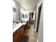 Bathroom with dual vanities, tile flooring, and updated fixtures at 811 Wynnshire Dr # A, Hickory, NC 28601