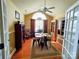Bright dining room with vaulted ceiling, hardwood floors, and elegant furnishings at 811 Wynnshire Dr # A, Hickory, NC 28601